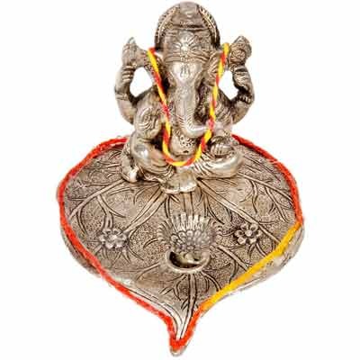 Lord Ganesha Pretty Pooja Idol in White Metal